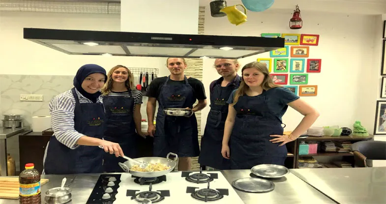 Group of tourists having cooking Class, Mysore Image
